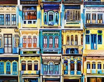 Colorful artistically painted row of storefronts or buildings with detailed windows and doors.