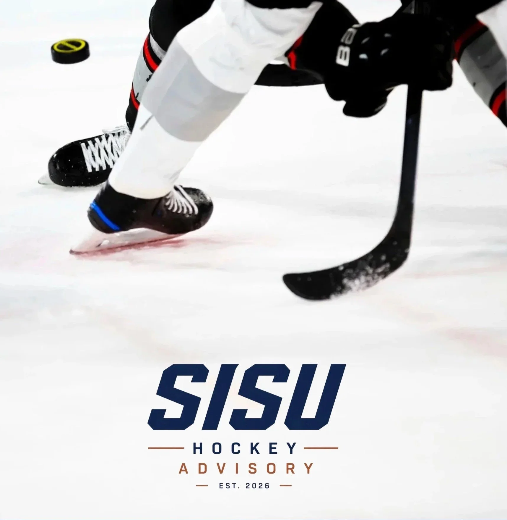 Close-up of a hockey player's skates and stick on ice, with the logo 'Siskiu Hockey' and 'Advisory' printed on the ice surface.