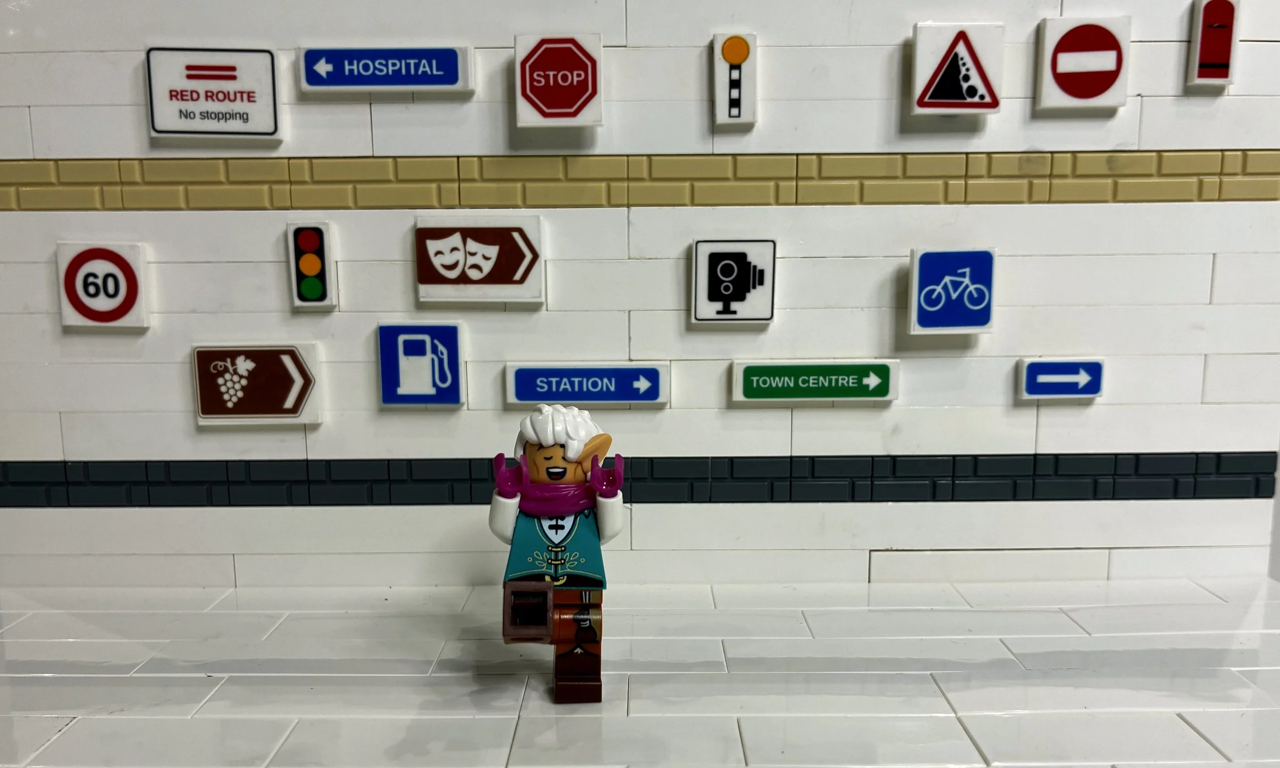 Finishing a LEGO city street: signs that sell the scene