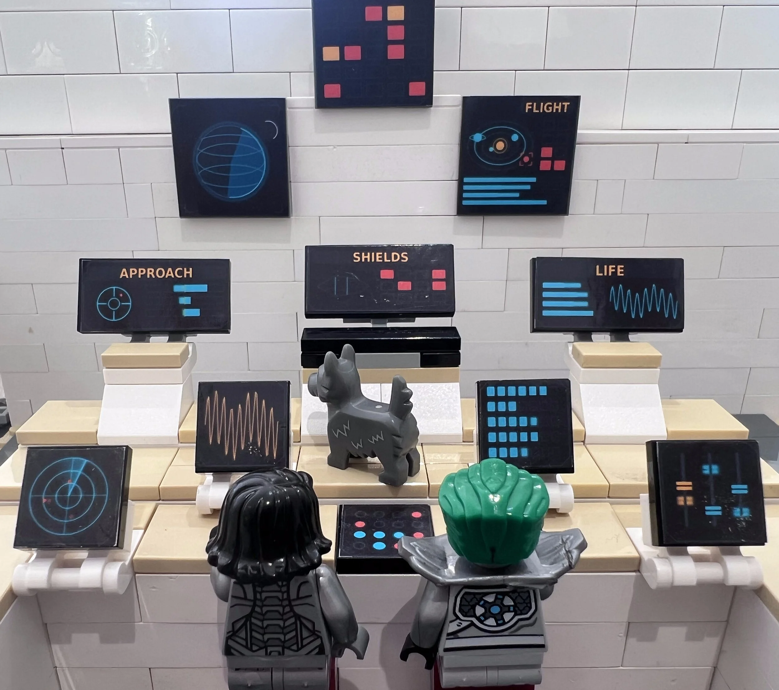 LEGO spaceship cockpit wall detailed with control panel stickers on tiles