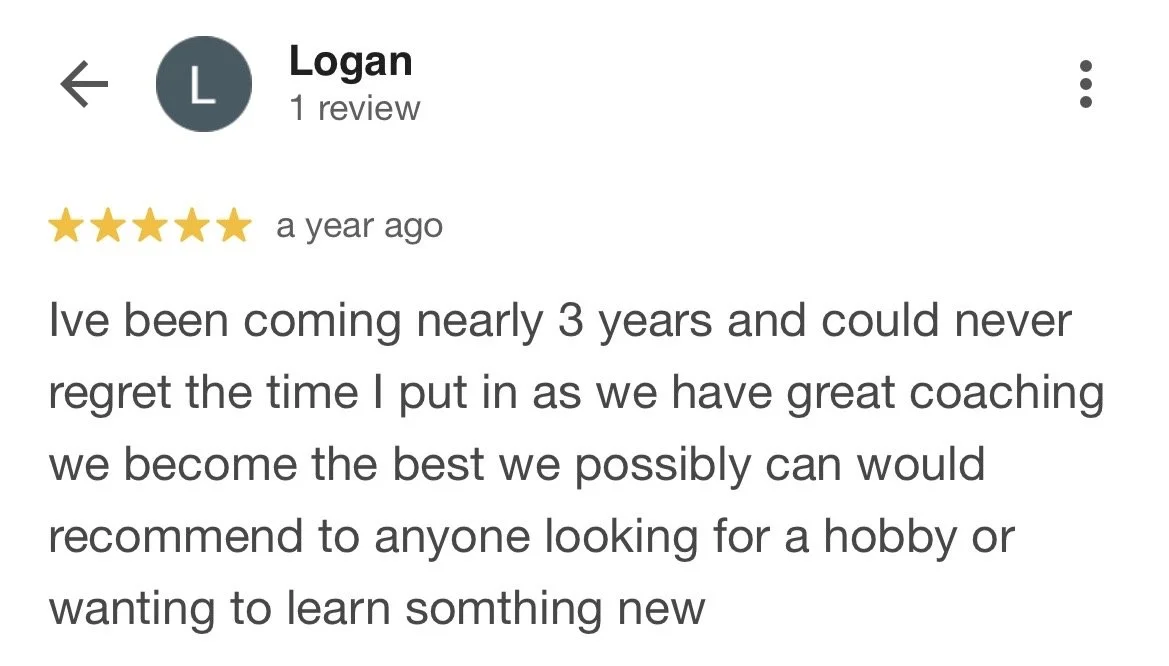 Screenshot of a Google review for a coaching service, written by Logan, with five stars, praising the coaching experience.