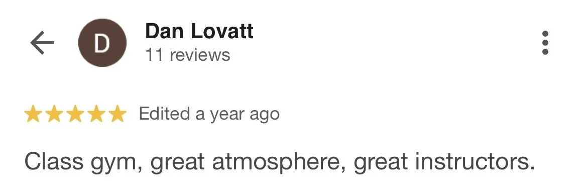 Google review for Dan Lovatt, five stars, praising the gym's atmosphere and instructors.