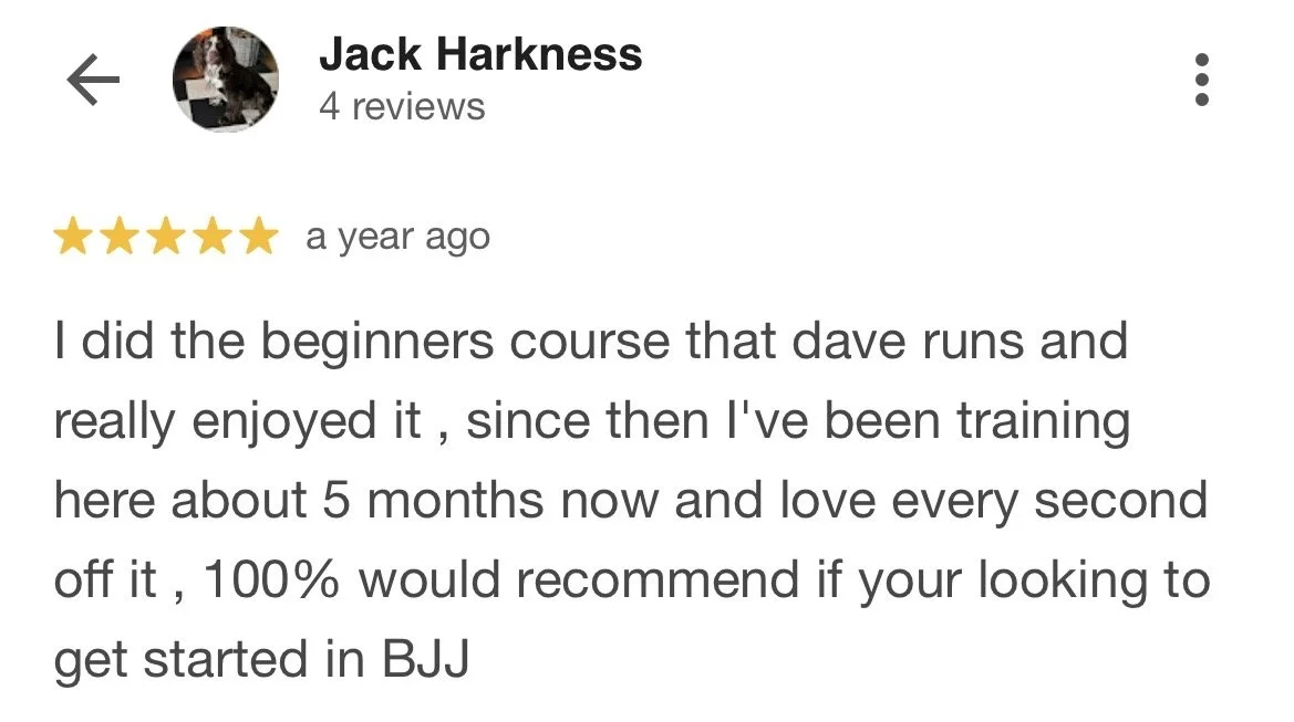 Screenshot of a Google review from Jack Harkness praising a beginner's BJJ course