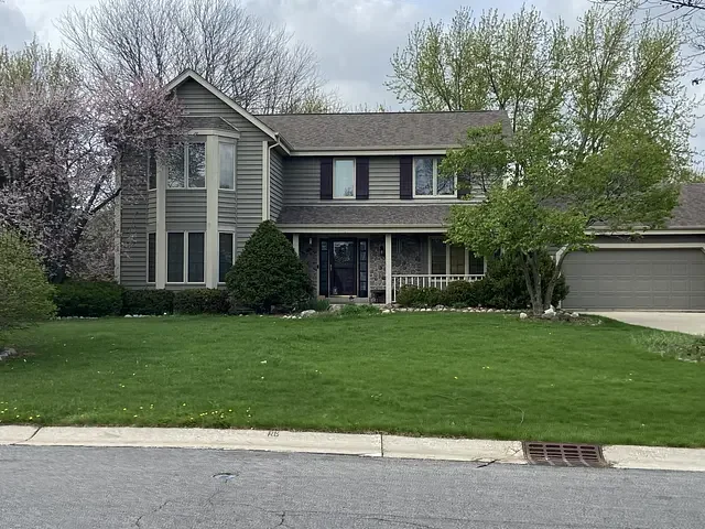 Professional house washing service removing dirt and mildew