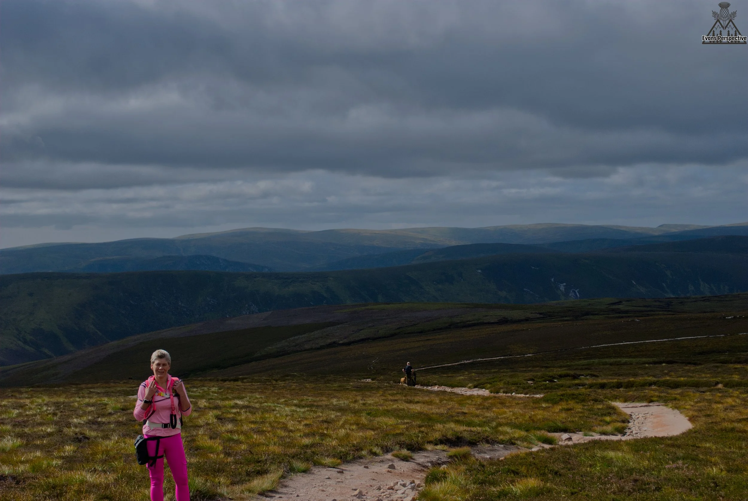 Outdoor family portrait session exploring the vast mountain summits of Scotland.