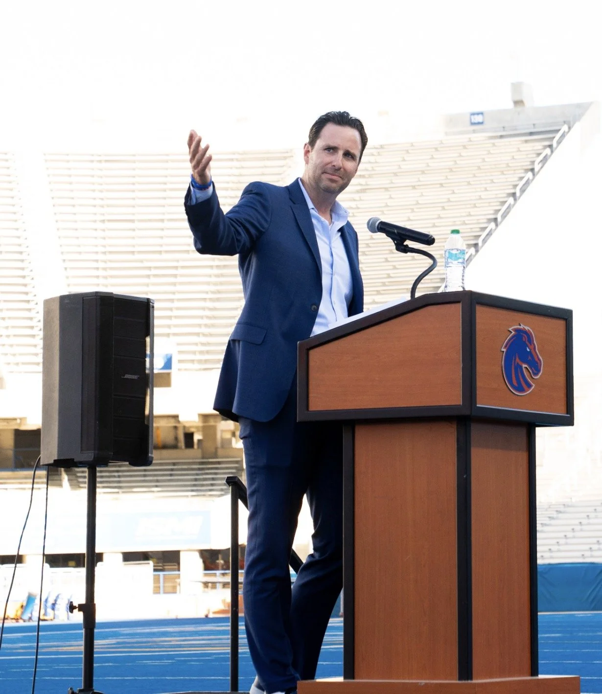 Boise State Athletic Director Jeramiah Dickey speaking at Albertsons Stadium.
