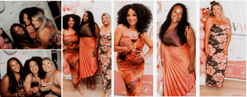 Group of women at a celebration or event, some holding wine glasses, posing for photos in stylish dresses, with pink and white balloon decorations in the background.