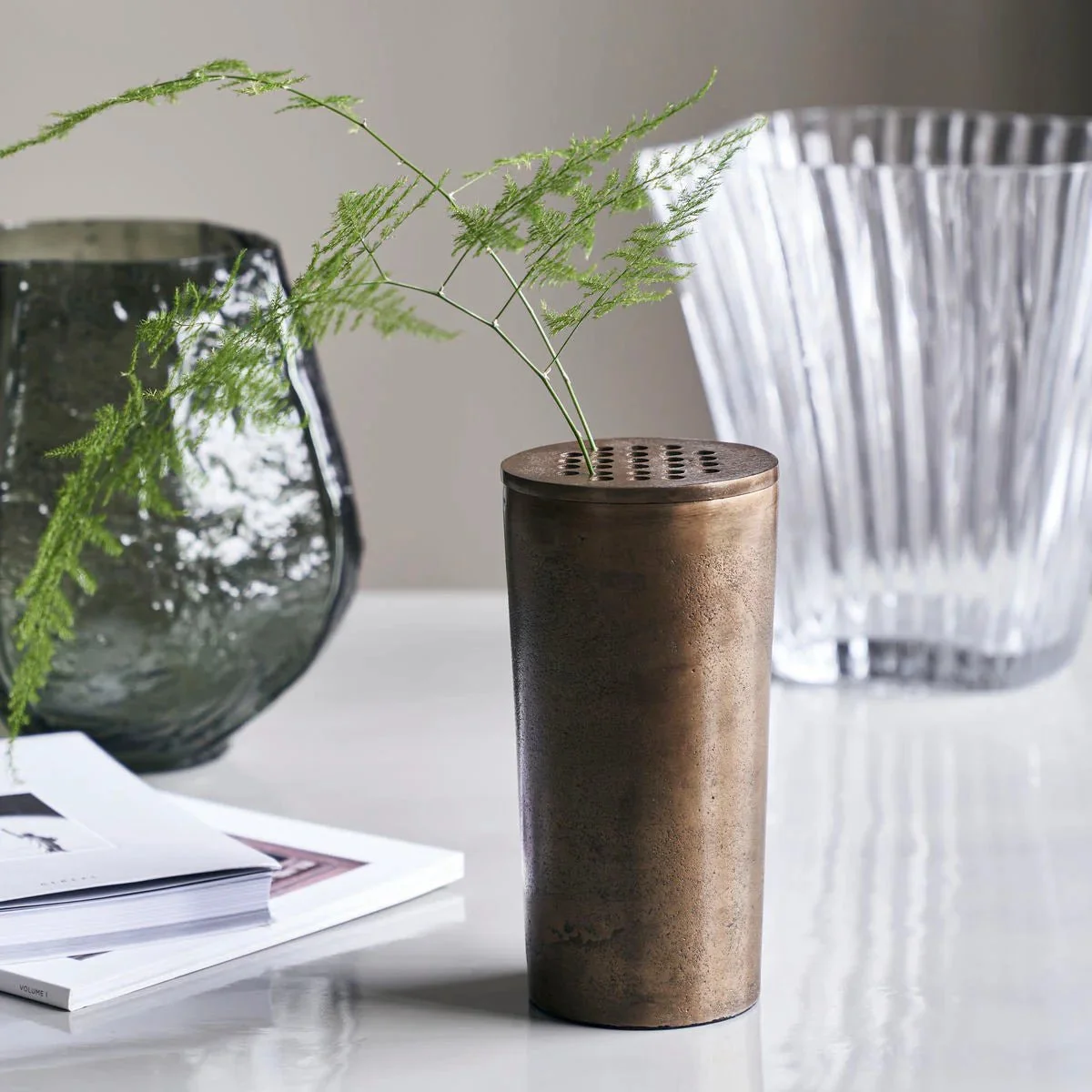 A handmade cast metal vase purchased from Lusso Boutique at The Barn Queenstown