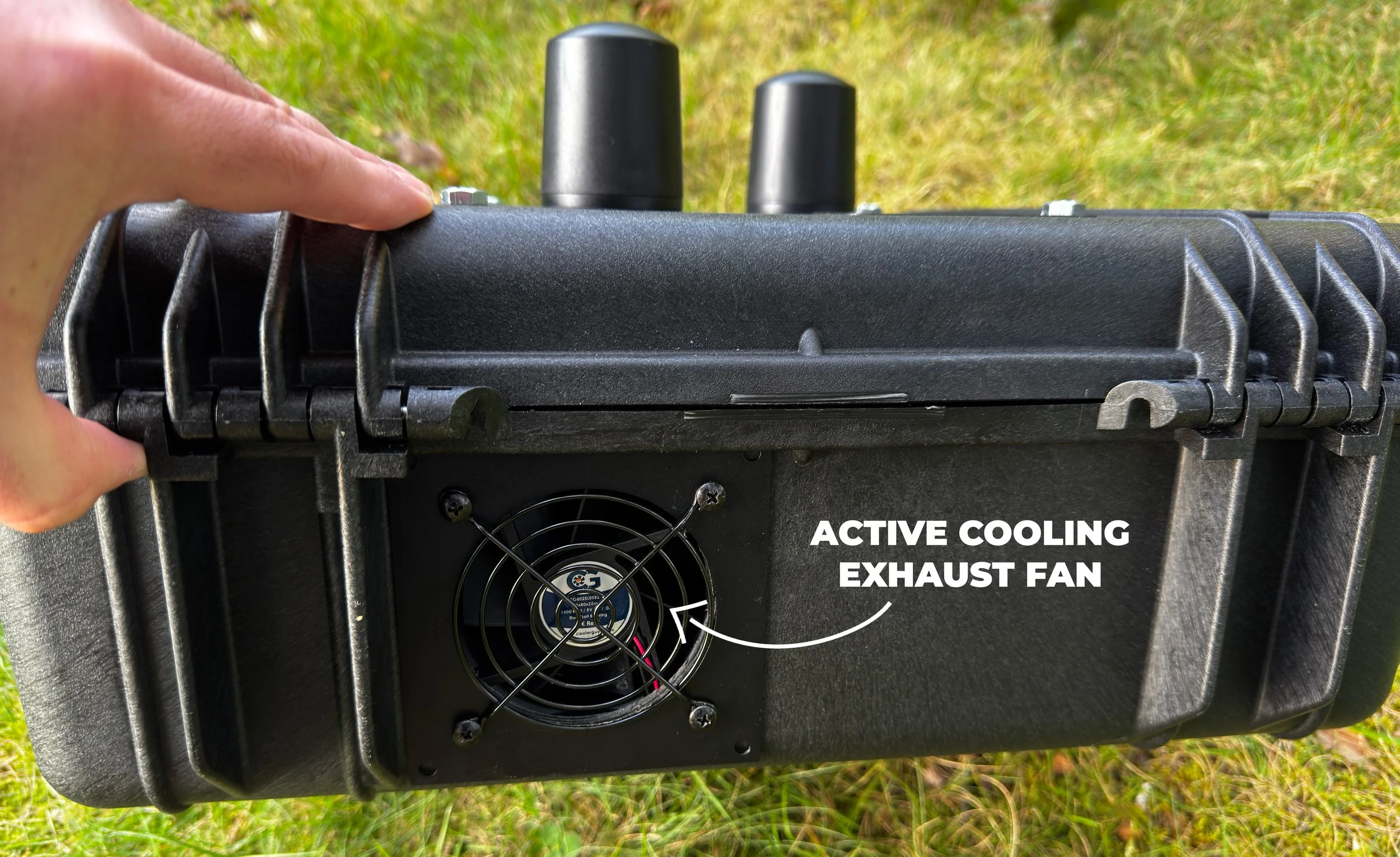 Close-up of an active cooling exhaust fan in the live mission relay box.