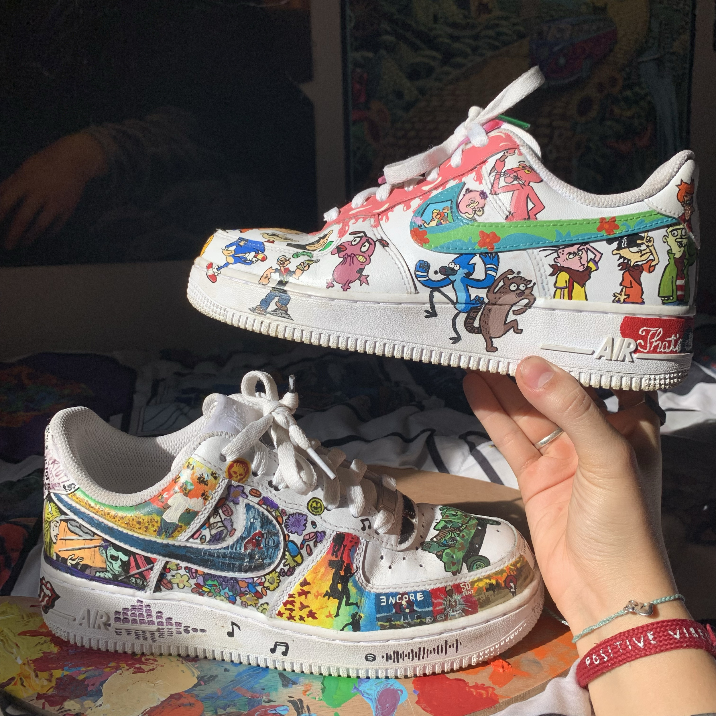 Cartoon characters painted on Nikes. Regular Show, Courage the Cowardly Dog, Sonic, Codename Kids Next Door, Popeye, Ed Edd Eddy, Looney Tunes. And Music Albums