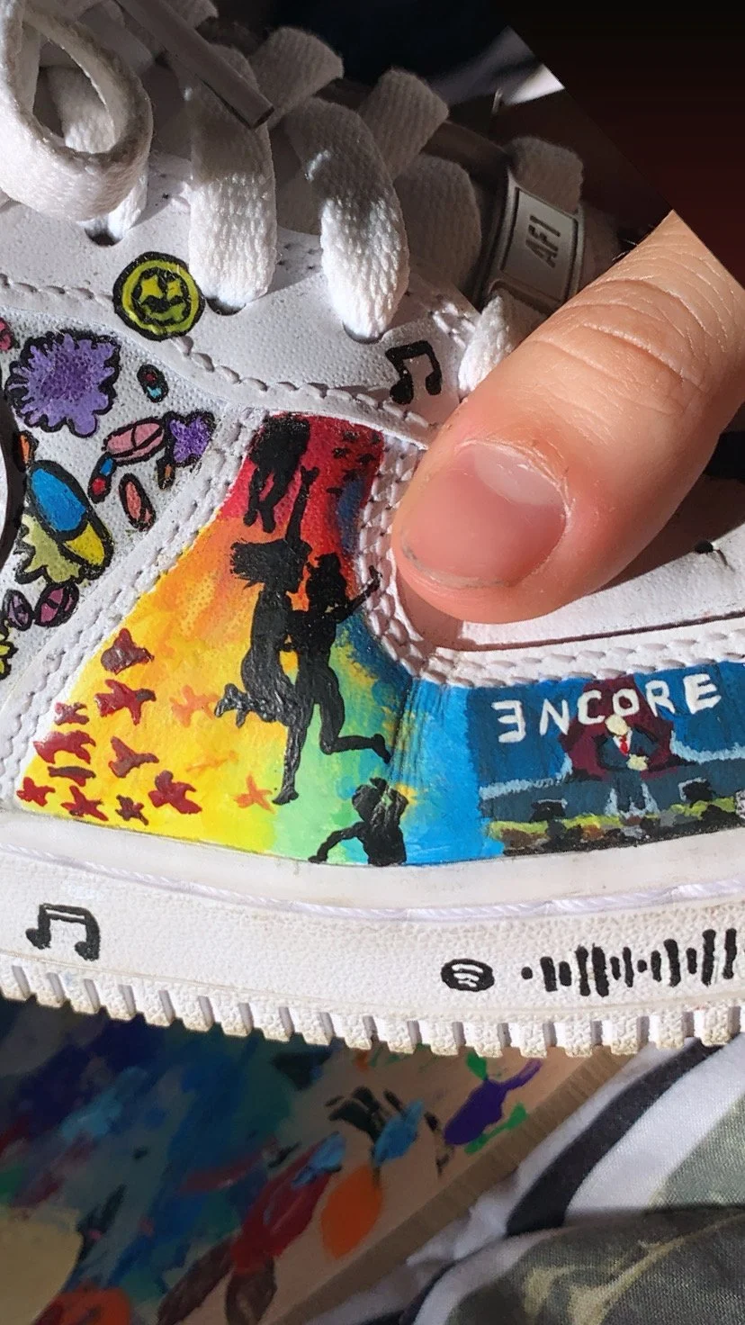 Part of a shoe I painted in 2020. Album covers of All Time Low's "So Wrong It's Right" and Eminem's Encore 