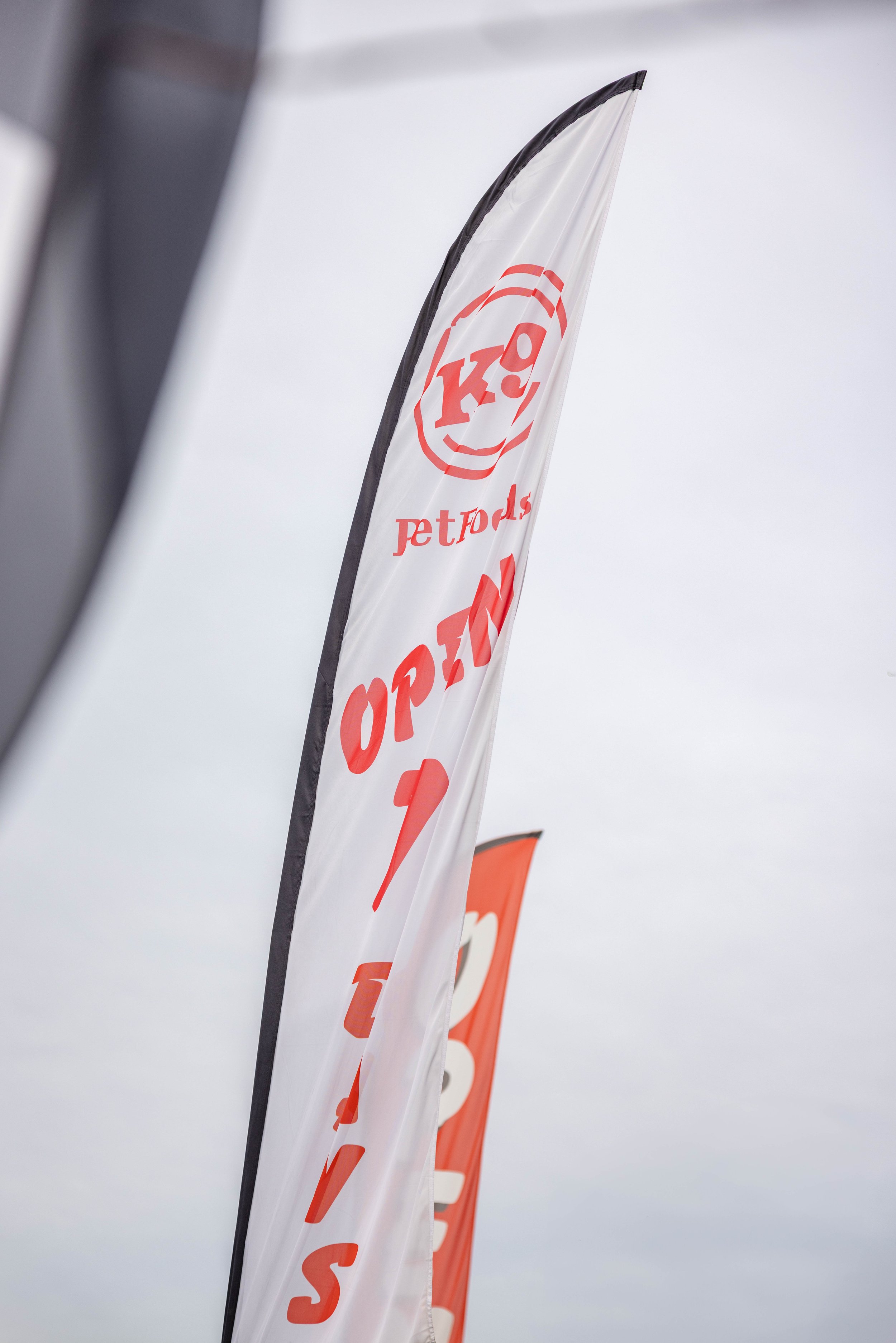 K9 Pet Foods flag outside the Hastings pet food store