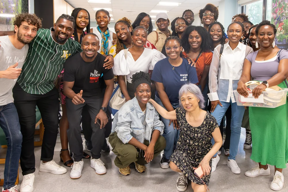 A large group of Ignite members posing for the camera at an outreach event.