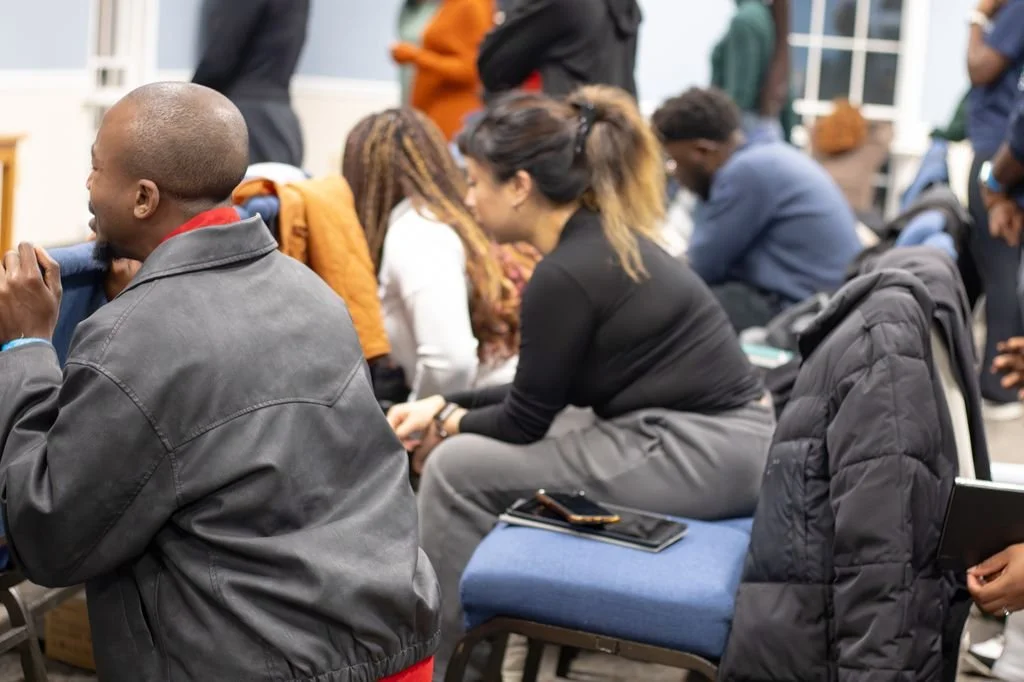 Ignite members in prayer at Godfidence 2025.