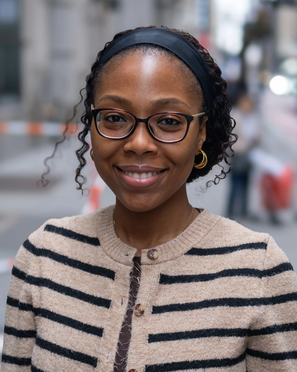 Headshot of Tunmise O., Operations and Community Welfare coordinator at Ignite Church.