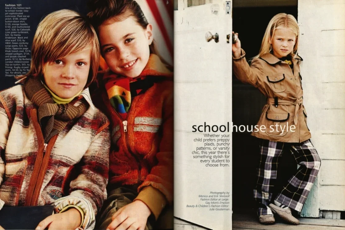 Magazine spread featuring children in schoolhouse style clothing, with two boys on the left smiling at the camera and a girl on the right standing outside a schoolhouse in plaid pants and a tan jacket.