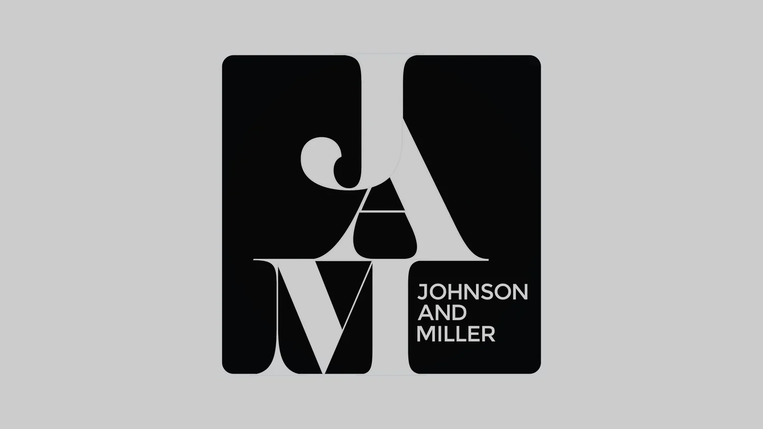 Black and white logo for Johnson and Miller with stylized letters J, A, M, and M arranged within four black rectangles on a gray background.
