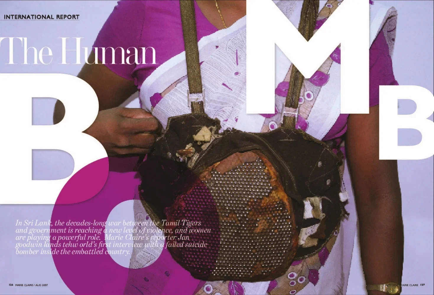 Close-up of a woman wearing a purple and white traditional dress with gold jewelry, holding a damaged, burnt bag.