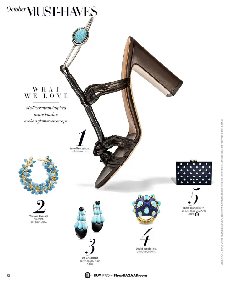 Advertisement featuring a Mediterranean-inspired sandal with black straps and a chunky heel, paired with five jewelry items: a blue and gold bracelet, matching drop earrings, a large statement ring with blue and yellow detailing, and a black clutch w
