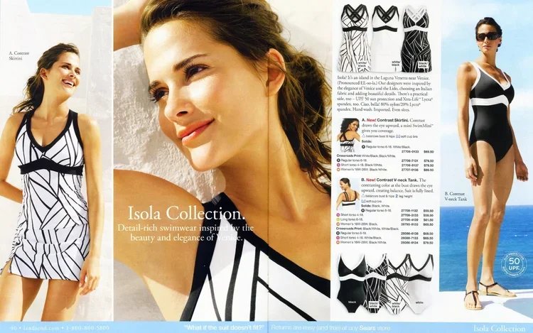 A woman on a beach wearing a black and white striped swimsuit from the Isola Collection, showcasing swimwear with detailed design and elegant style.