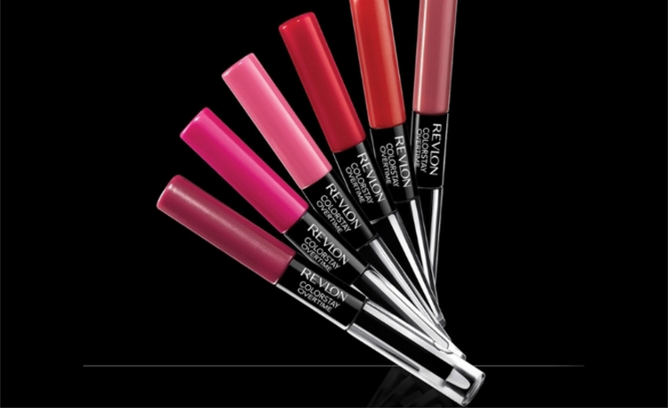 Five Revlon ColorStay lipstick tubes with various shades displayed against a black background.