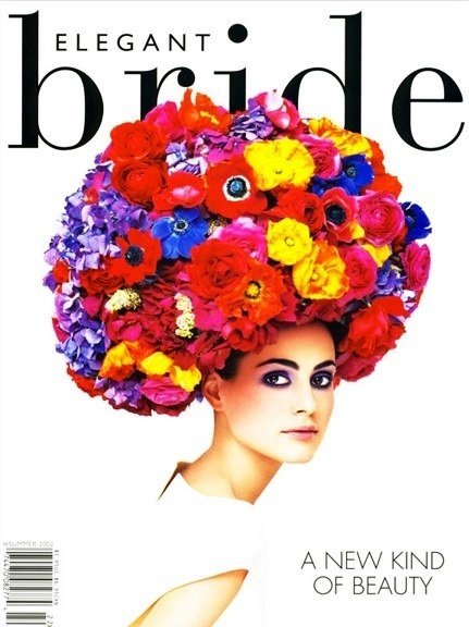 Magazine cover titled 'Elegant Bride' featuring a woman with a large floral headpiece made of colorful flowers and makeup.