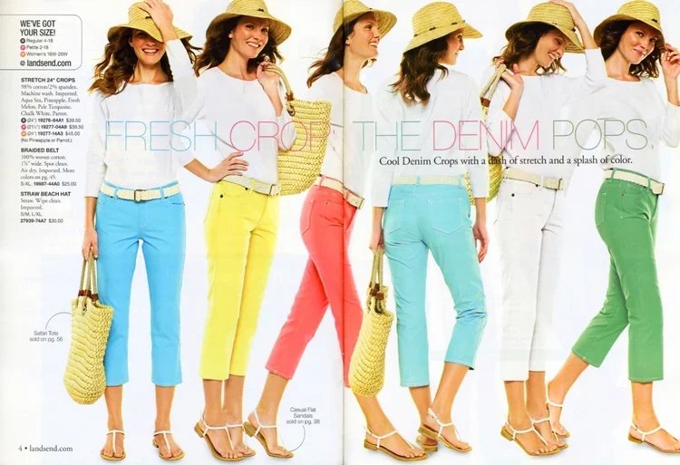 Six women wearing white tops, colorful capri pants, straw hats, and sandals, standing in a line with different poses, holding woven bags.