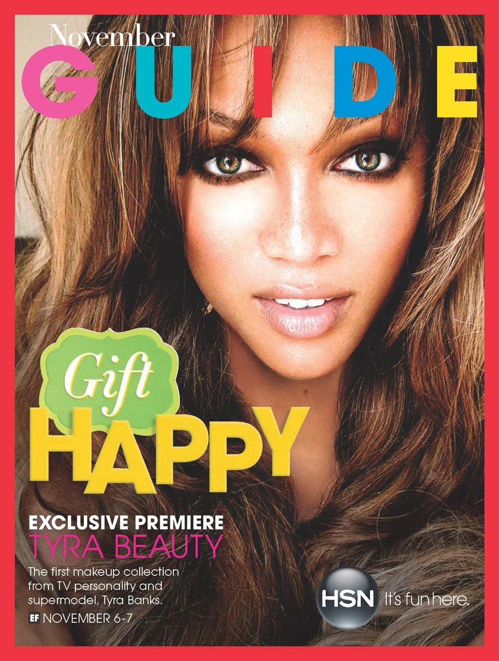Cover of a November guide magazine featuring a close-up of a woman with long, wavy brown hair and striking green eyes, with colorful text announcing a gift guide and the premiere of Tyra Banks' makeup collection on HSN.