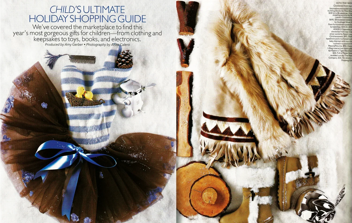 Child's winter clothing and accessories laid out on snow, including a brown fur-trimmed coat, tan winter boots, wooden logs, a fringed blanket or shawl, and a pair of mittens, with a blue and brown tutu with a bow and a pair of striped gloves, alongs