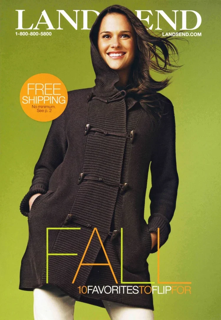 Magazine cover featuring a smiling woman modeling a dark winter coat against a green background, with text about fall fashion and free shipping.