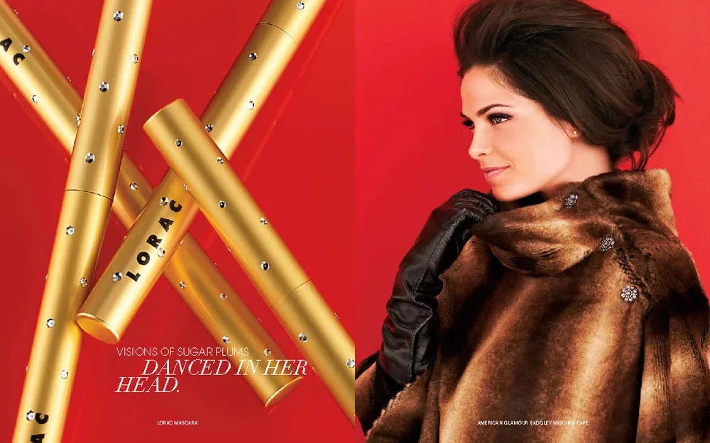 An advertisement featuring Lorac mascara tubes on a red background on the left, and a woman with short dark hair wearing a fur coat and black gloves on the right.