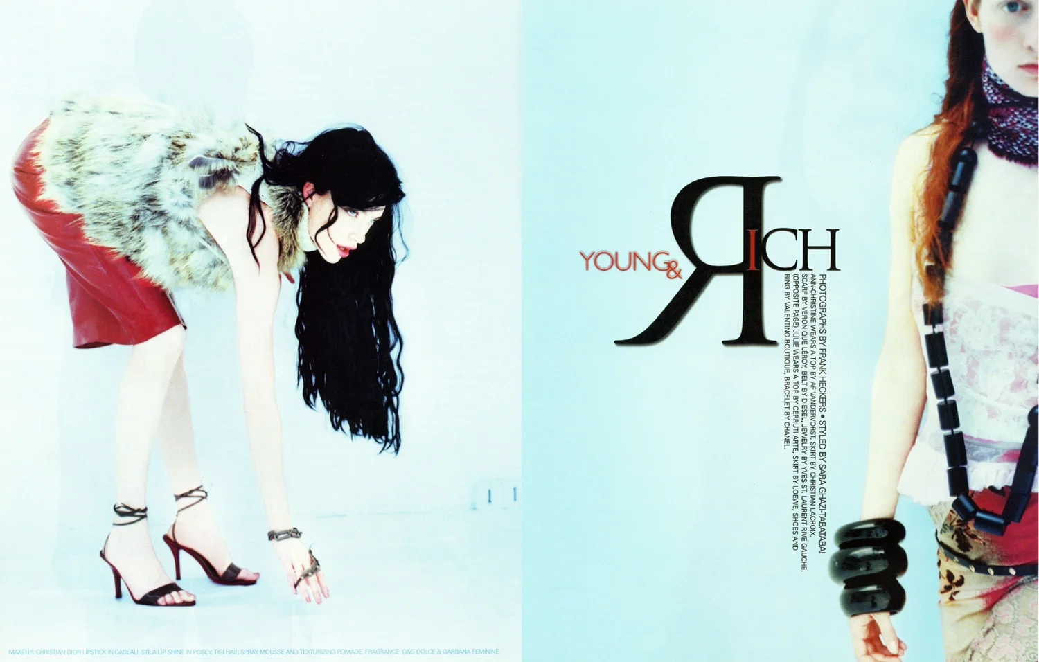A woman with long black hair is bent over, wearing a red skirt, high heels, and a fur collar. To the right, part of another woman with red hair, wearing a scarf and accessories, is visible. The background is light blue with the words 'YOUNG & RICH' a
