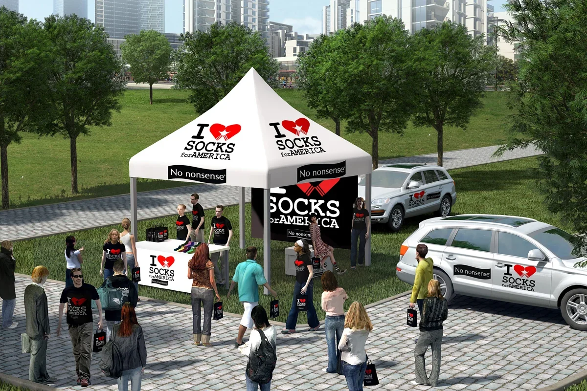 A promotional event for socks in a park with a white tent that has 'I ♥ SOCKS for AMERICA' and 'No nonsense' banners. People are gathering, some wearing matching socks, and there are parked cars branded with the same slogans.
