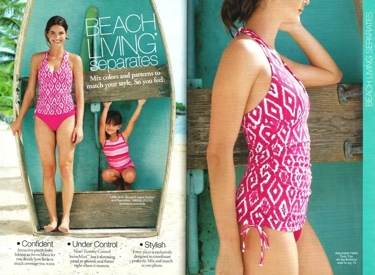 Women and girl in swimsuits at the beach, with a sign reading "Beach Living separates".