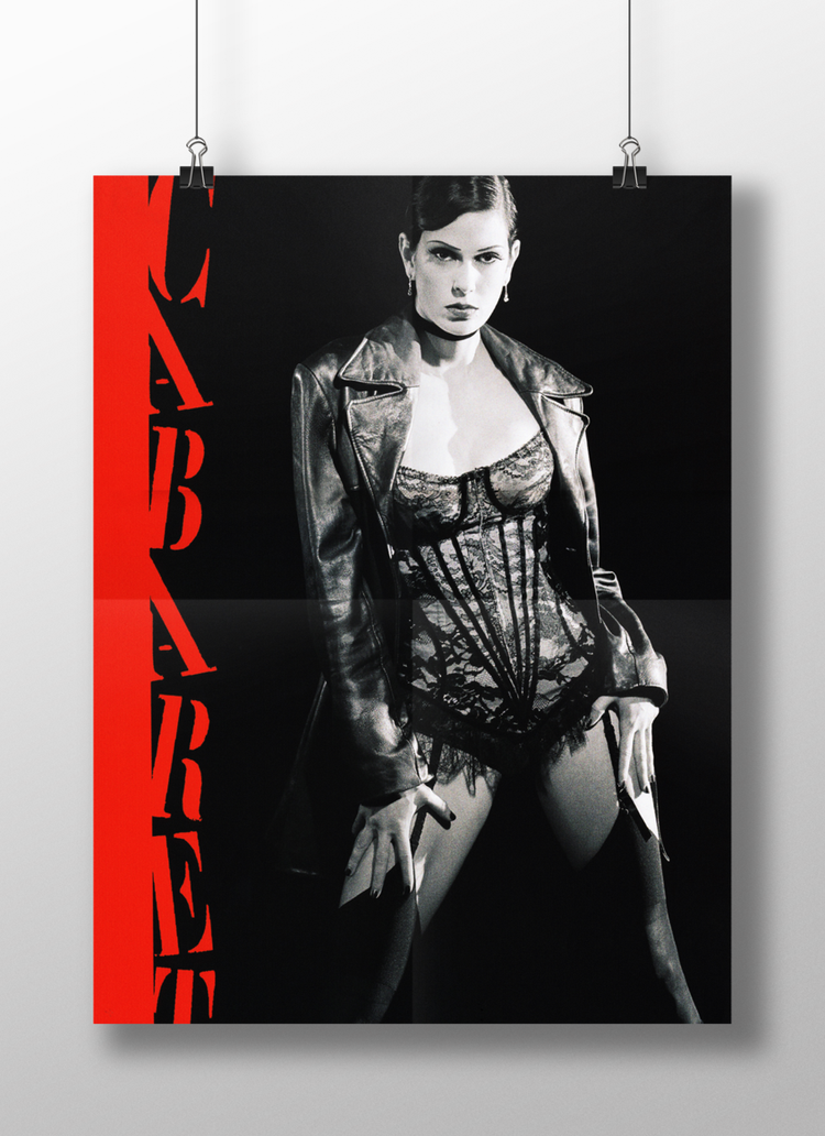 Black and white poster of a woman in lingerie and a leather jacket, standing in a confident pose, with red text along the left side.