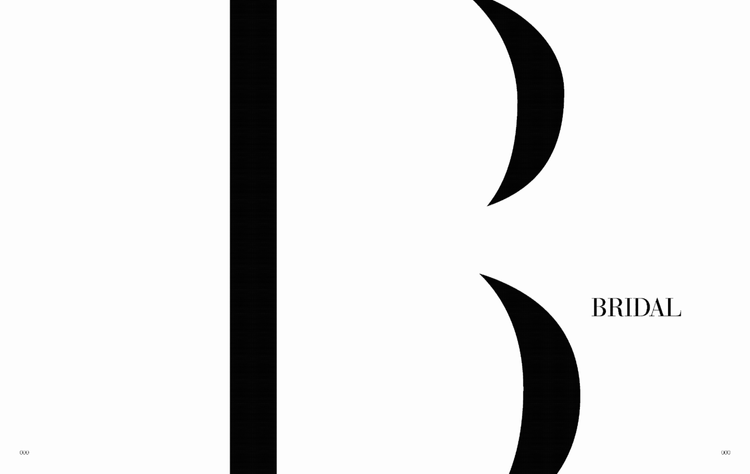 Close-up of a magazine page featuring a large black letter 'B' and the word 'BRIDAL' in small font.