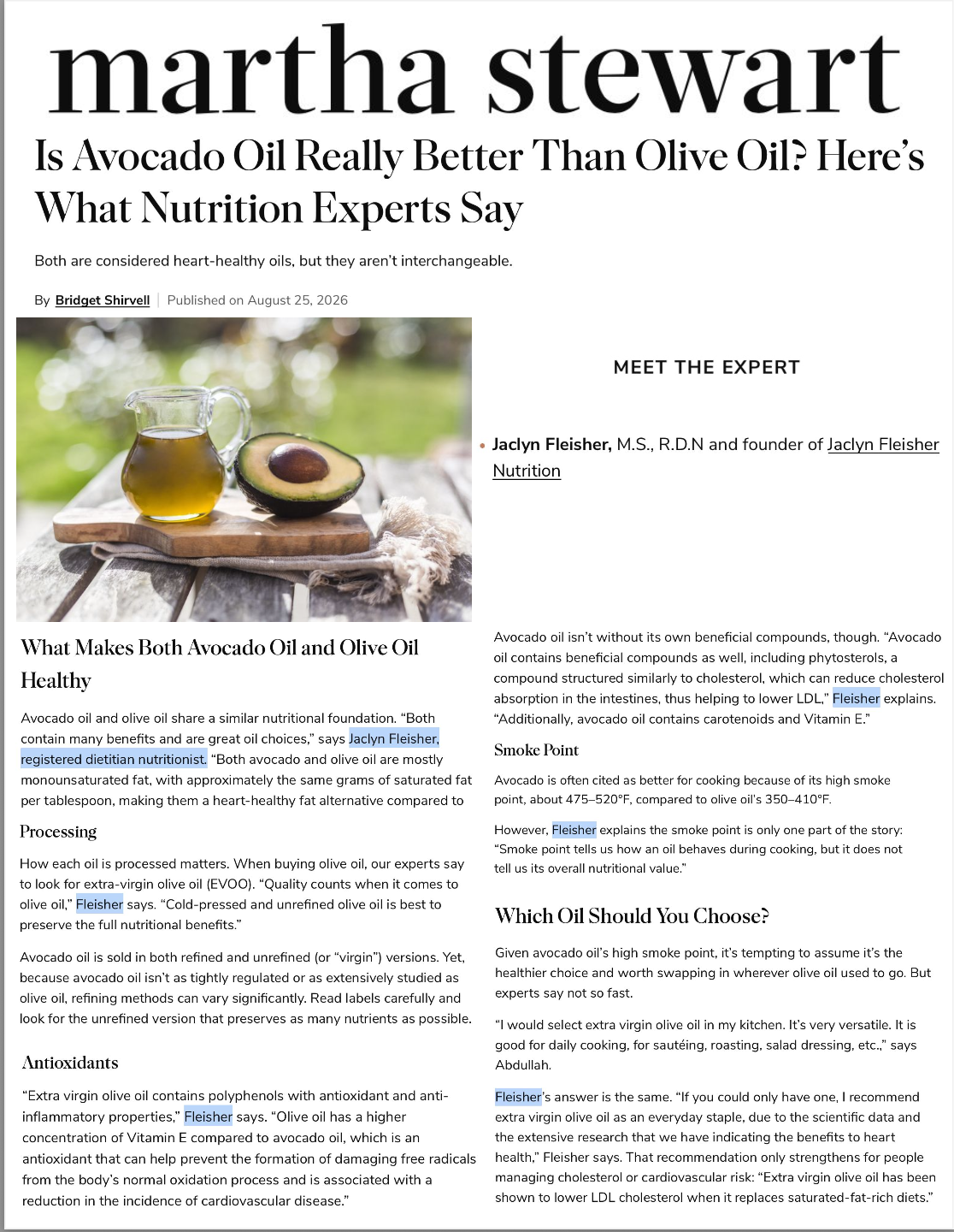 An article titled 'Is Avocado Oil Really Better Than Olive Oil? Here's What Nutrition Experts Say,' featuring a photo of a glass pitcher of avocado oil and a halved avocado on a wooden board outdoors.