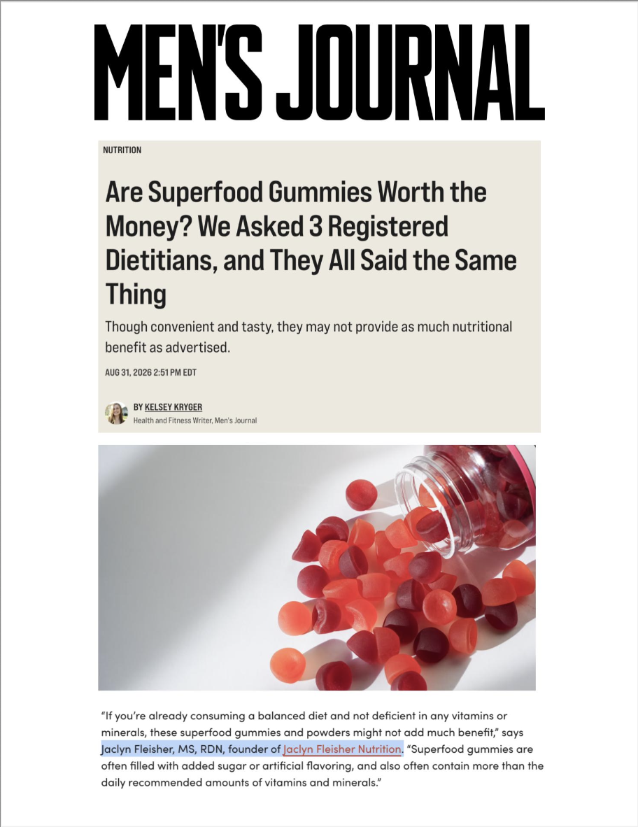 Article headline from Men's Journal about whether superfood gummies are worth the money, with a photo of red and pink gummy vitamins spilled from a bottle.