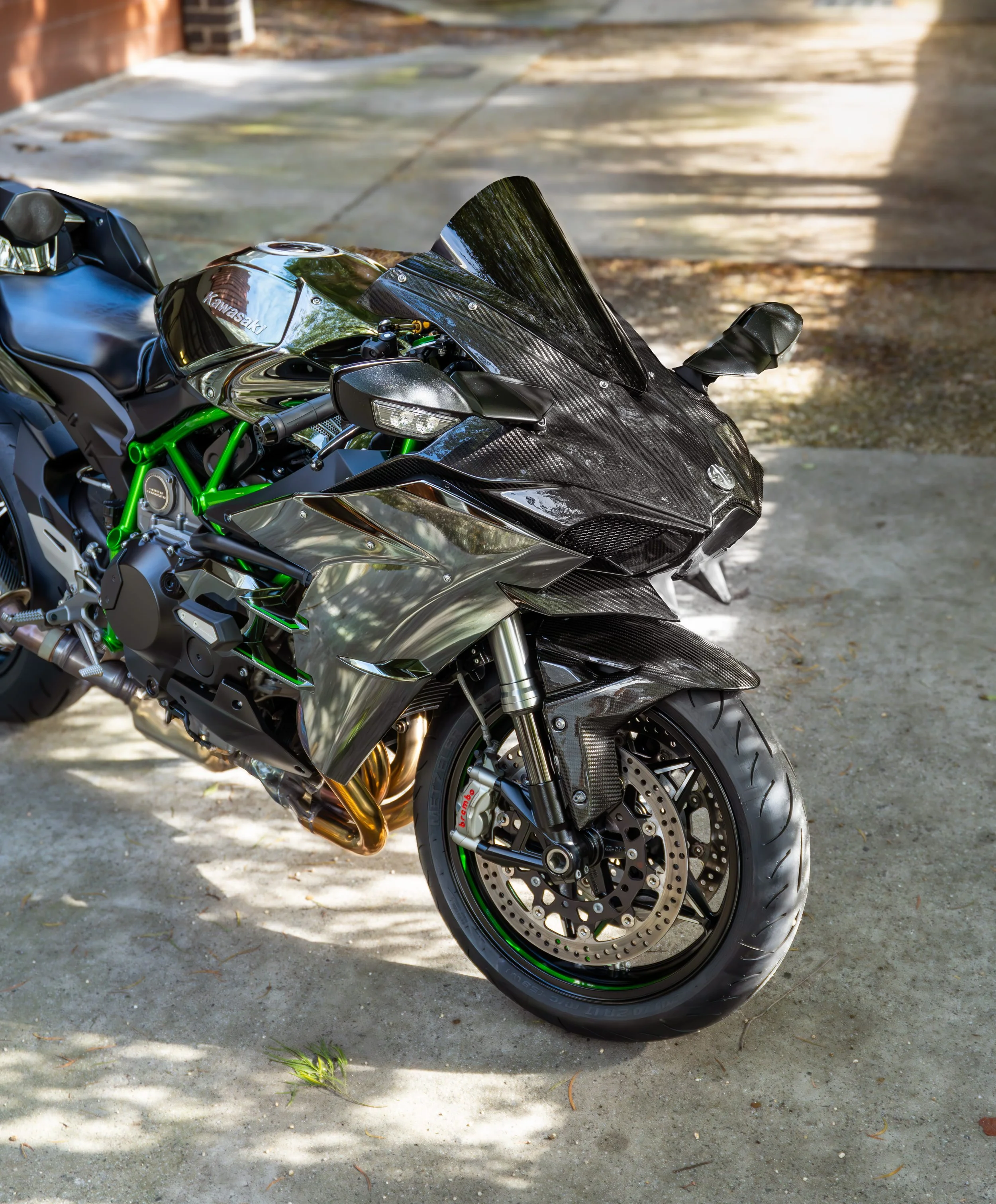 Close-up of a Kawasaki H2 motorcycle at Curated - Specialised Detailing's studio in Cheltenham, Melbourne.