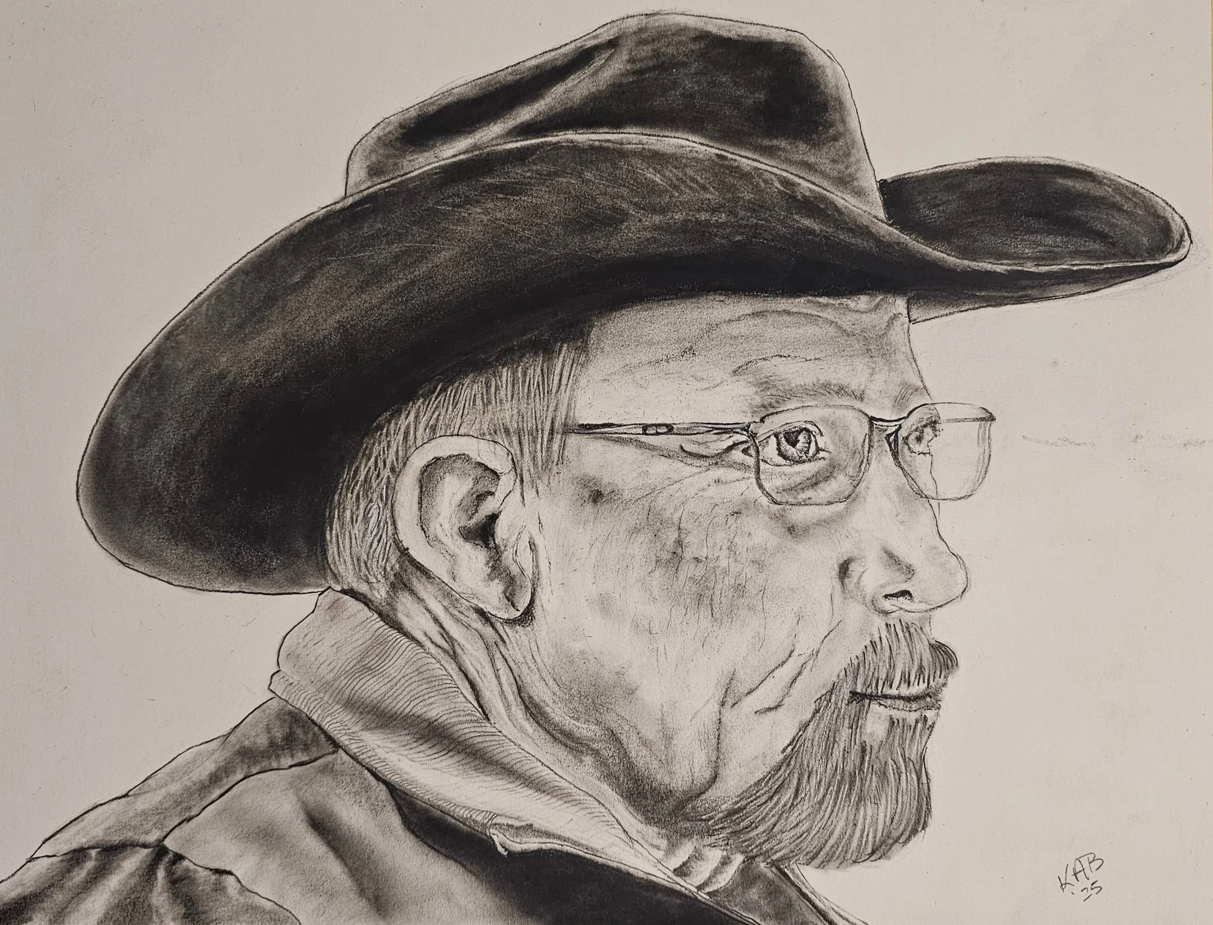 A detailed black and white portrait sketch of a man in profile, wearing glasses and a wide-brimmed hat, with visible textures and shadows highlighting facial features and clothing.