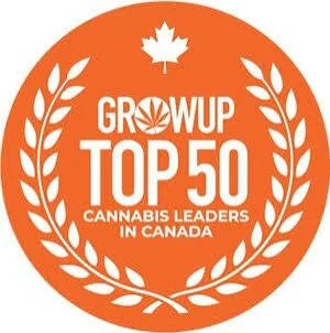 Orange circular badge with white text that reads 'Grow Up Top 50 Cannabis Leaders in Canada' and features a white maple leaf at the top surrounded by white laurel branches.