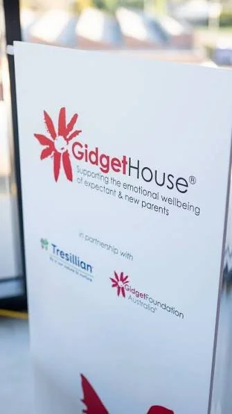 Sign for Gidget House supporting emotional wellbeing of expecting and new parents, with logos of Tresillian and Gidget Foundation Australia.
