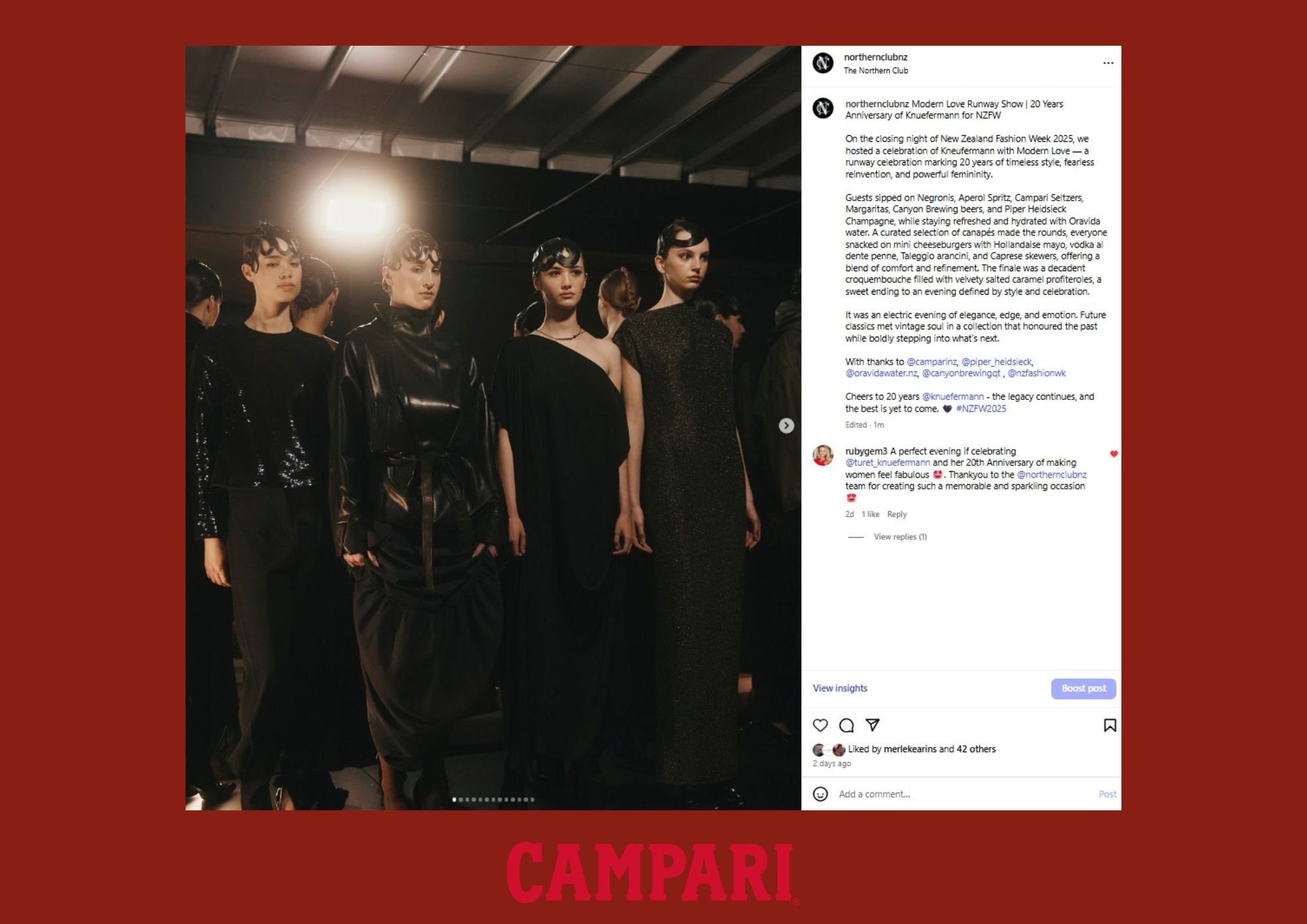 Photograph of five models standing in a row at a fashion event, dressed in black outfits, with shiny and elegant clothing. The background shows a metallic ceiling and bright lighting, indicating an indoor runway show setting. The models are looking f