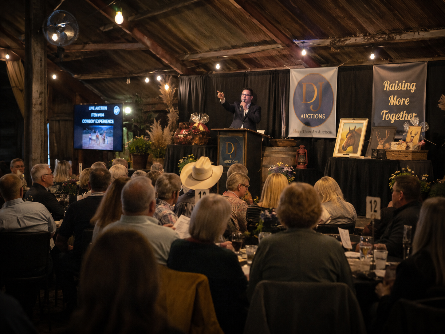 David Gonzalez conducting a live fundraising auction for a nonprofit benefit event in Boerne, Texas.