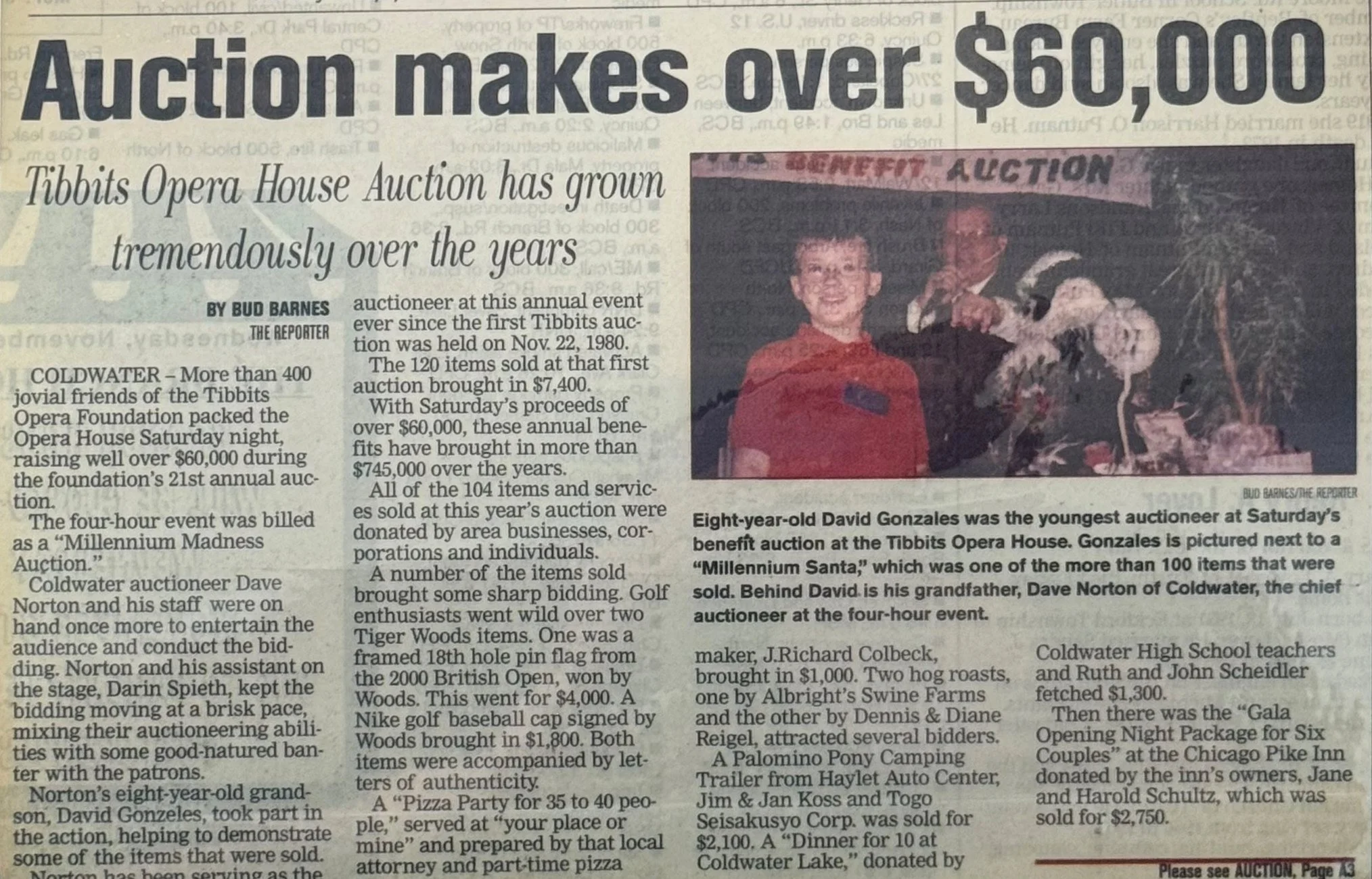 Historic newspaper clipping covering a Norton Auctioneers benefit auction for Tibbits Opera House that raised over $60,000.