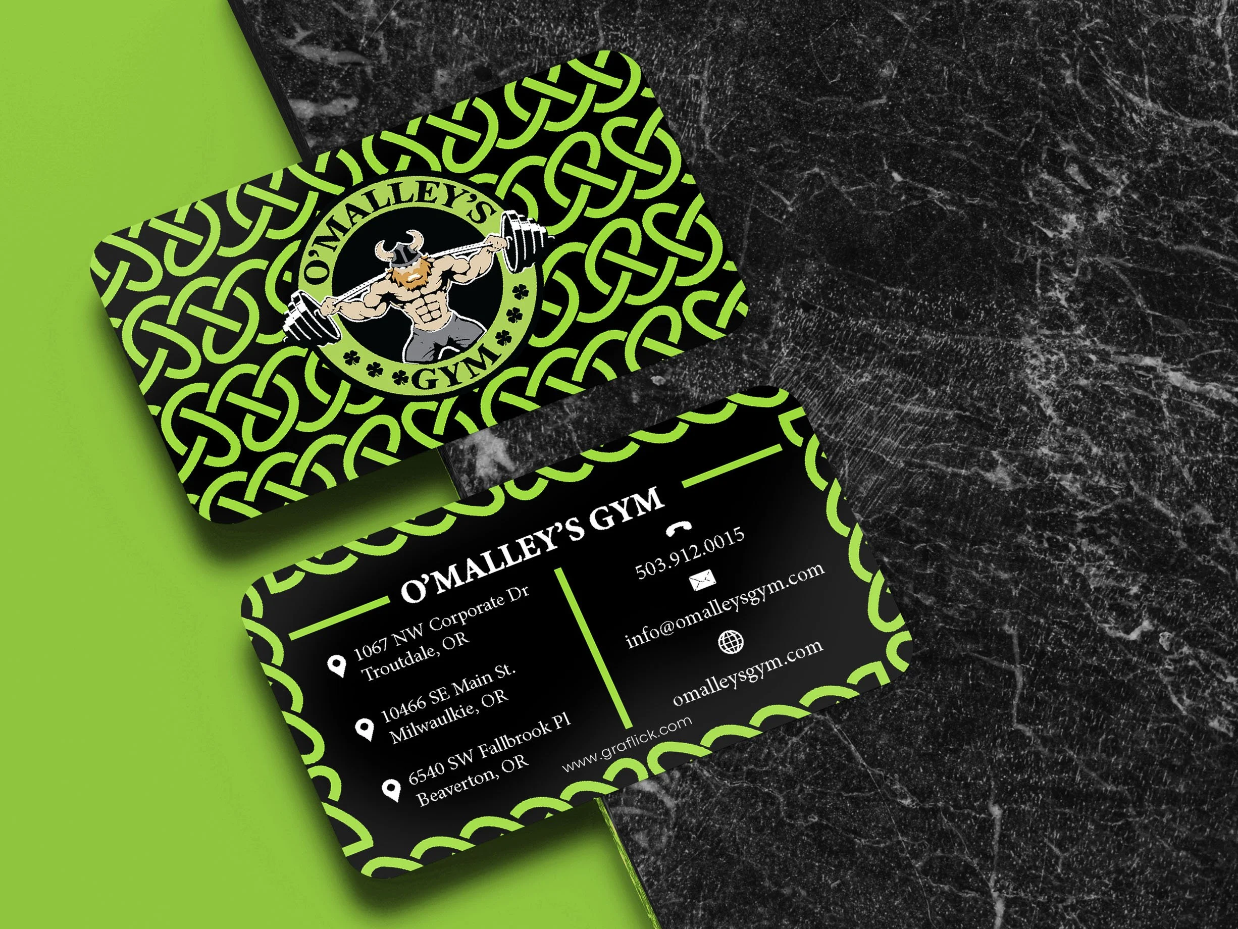 Close-up of a business card for O'Malley’s Gym