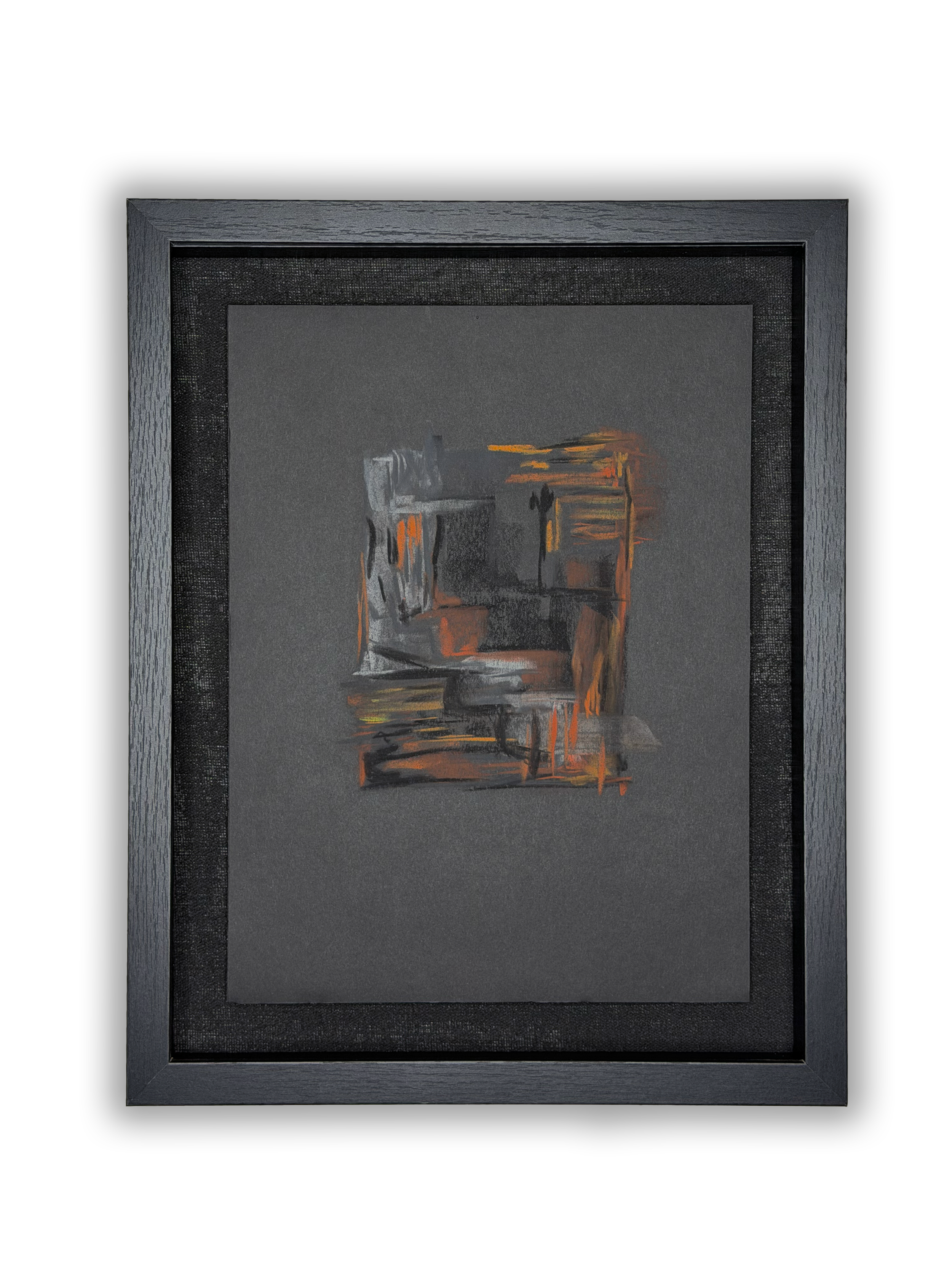 Framed painting of a city skyline at sunset, featuring dark buildings with reflections on the water and a vibrant orange sky.