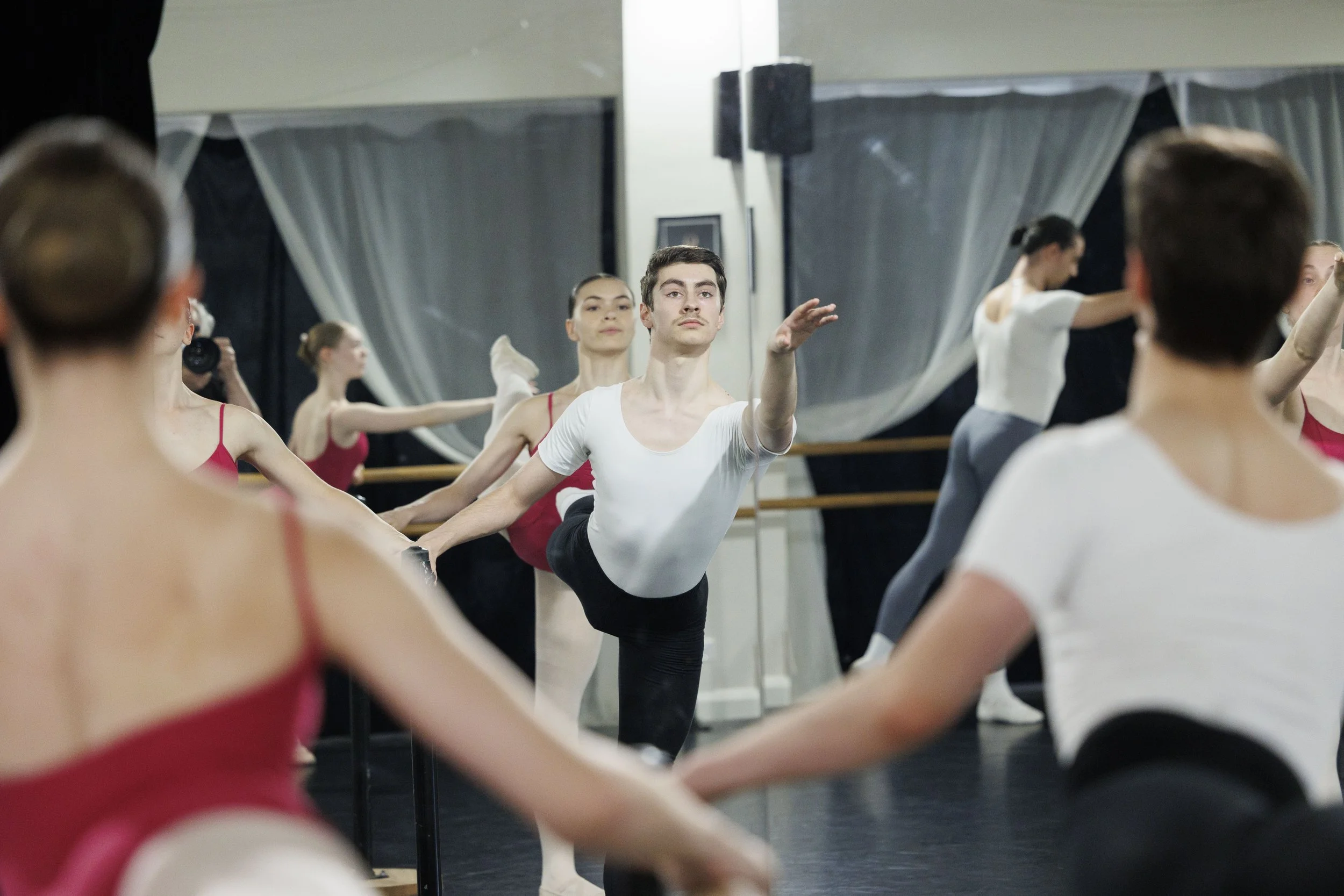 Pathway Program dancers training together at the ballet barre