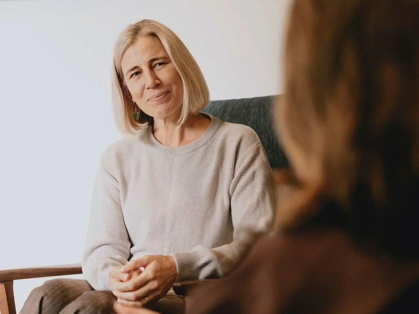 Nicky Scoltock in conversation during a spiritual companioning session in Auckland.
