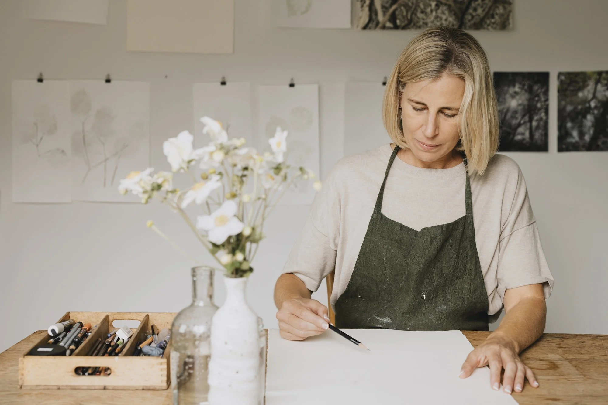 Nicky Scoltock working in her studio on the Instructions for Life series.